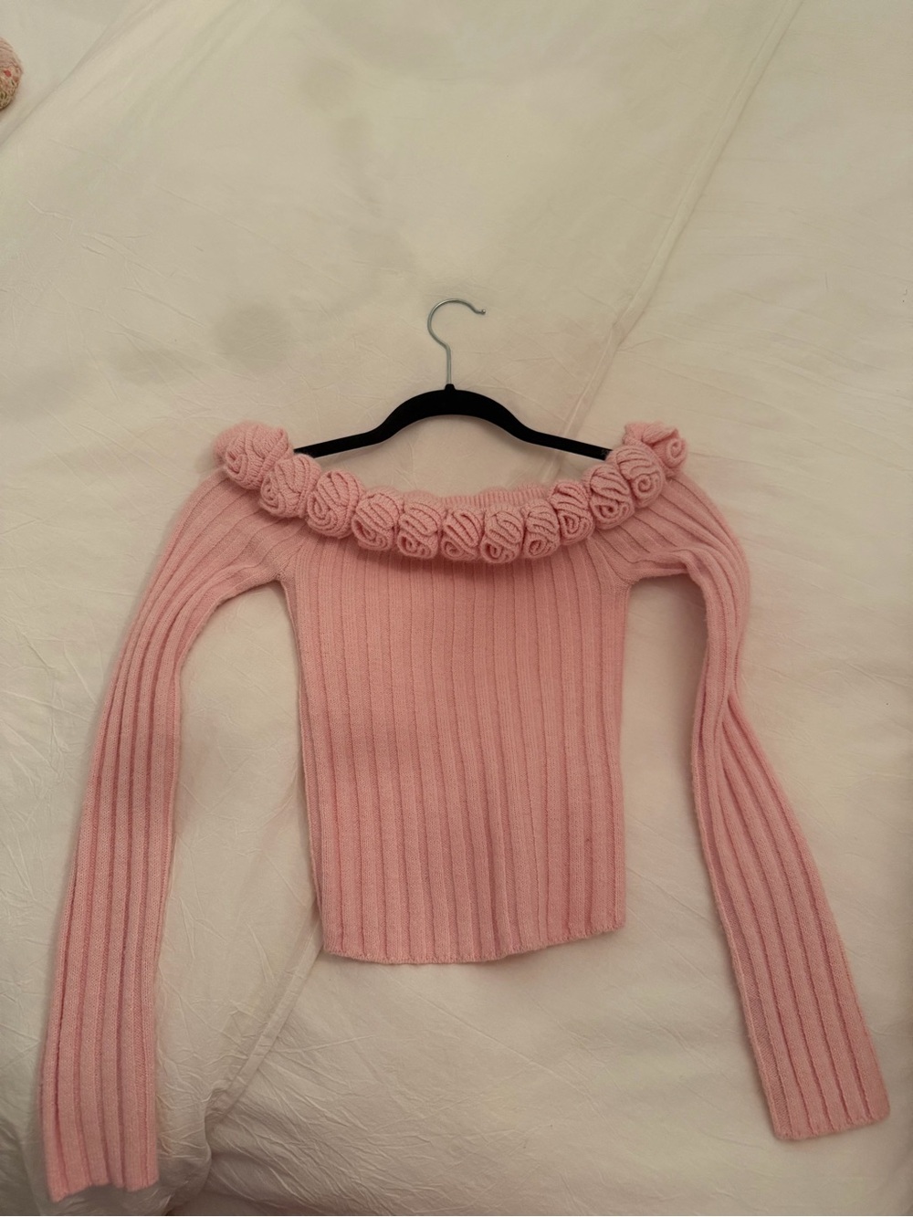 MAJORELLE Blush Pink Off-the-Shoulder Ribbed Sweater with Rosette Neckline